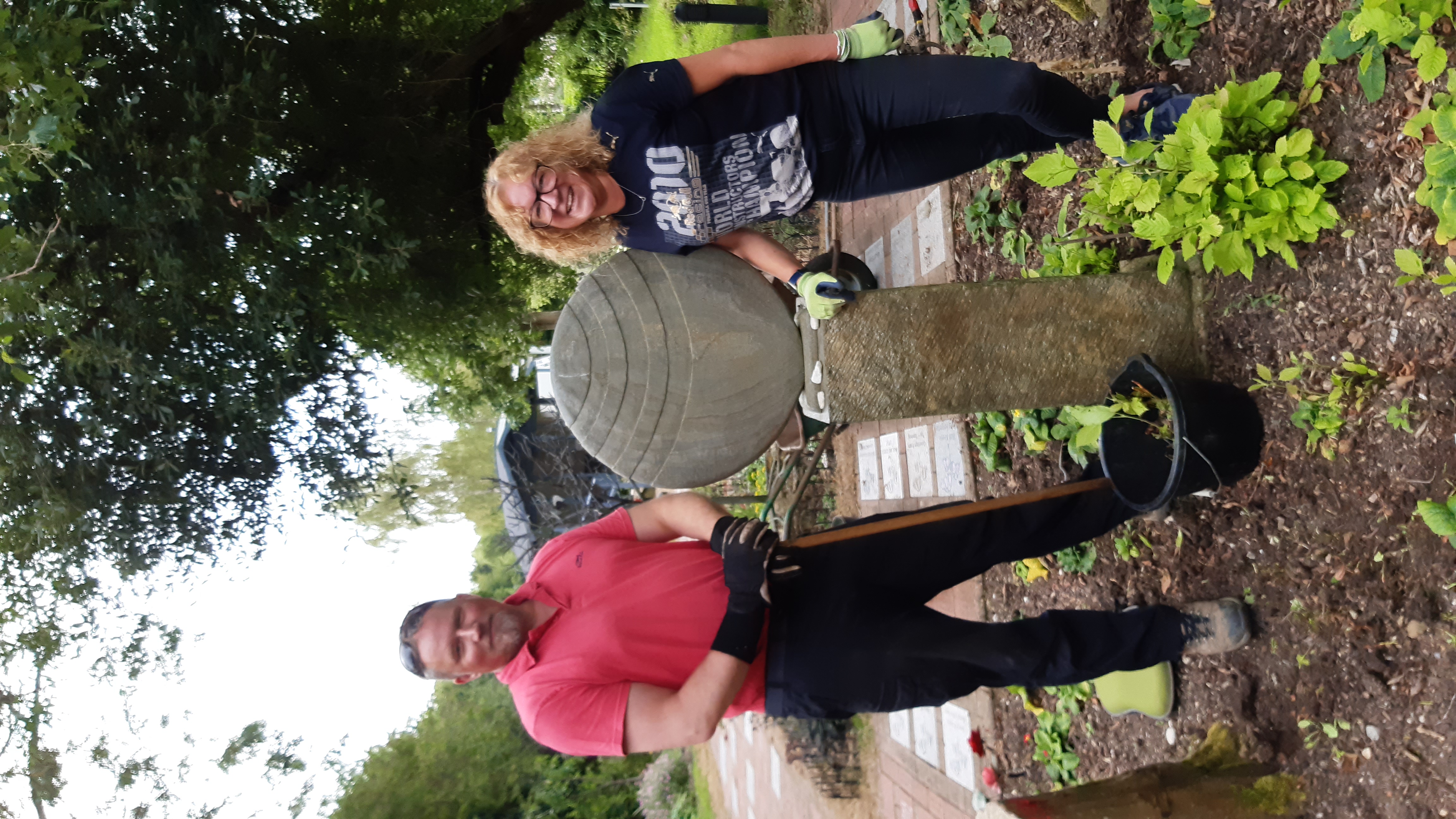 two people gardening
